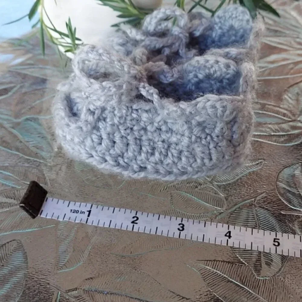 Handmade baby booties.